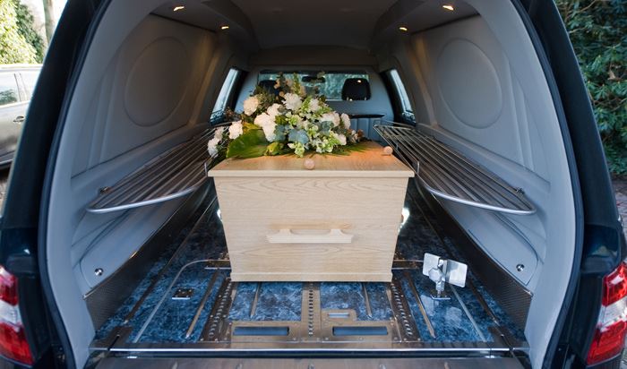 Coffin, in transport van 1